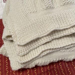 DKNY (Donna Karan New York) beautiful 100% cotton pale yellow decorative throw